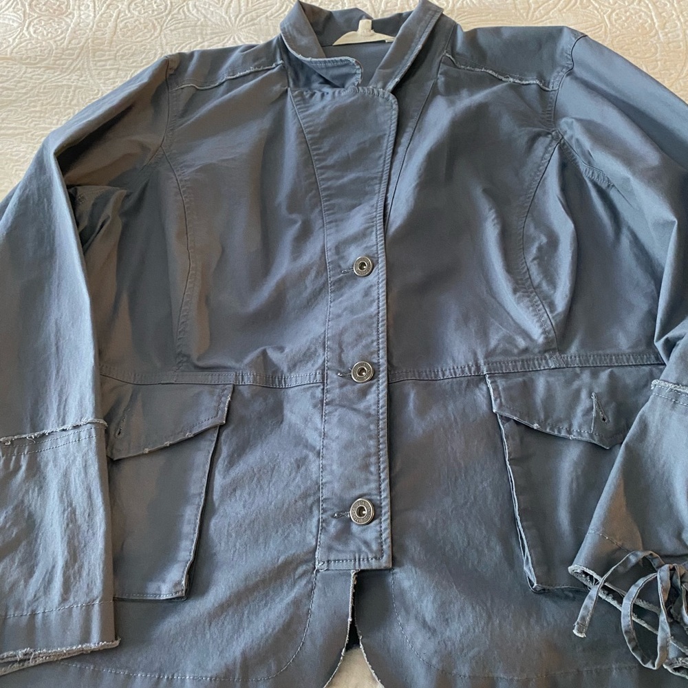 Very cute light blue Spring jacket. Distressed slightly. Great condition.
